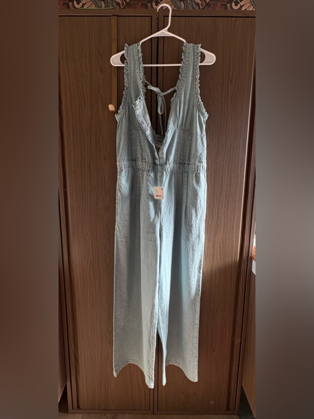 Free People Light Wash Denim Jumpsuit